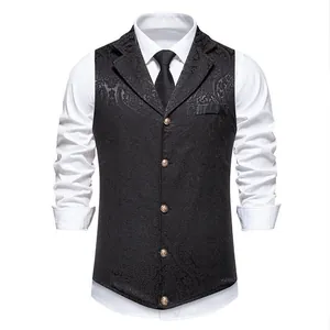 Detail of men's black paisley jacquard suit vest with gold buttons and lapel.