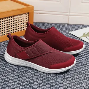 Breathable maroon mesh slip-on walking shoes for elderly with orthopedic comfort design