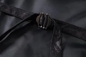 Macro view of the adjustable back buckle and jacquard texture on formal black men's vest.