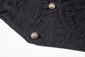Detailed view of black paisley jacquard fabric and vintage metal buttons on men's suit vest