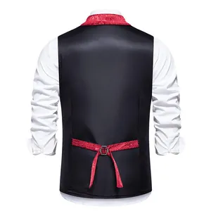 Detailed back view of elegant black suit vest featuring a red paisley adjustable strap