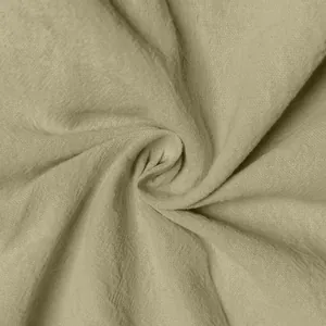 Macro close-up of breathable khaki linen fabric showing fine weave texture for cargo shorts