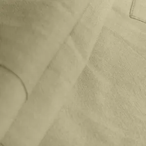 Macro view of the high-quality breathable beige linen fabric texture on men's cargo shorts.