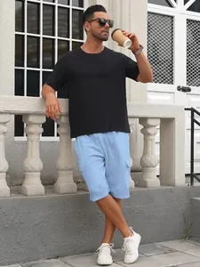 Summer casual outfit featuring breathable light blue multi-pocket cargo shorts for men.