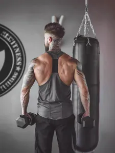 Débardeur de Sport pour Homme Couleur Unie Séchage Rapide en Polyester Gilet sans Manches pour Entraînement Fitness et Musculation