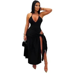 Elegant black two-piece outfit featuring a halter bodysuit and high-slit wrap skirt set