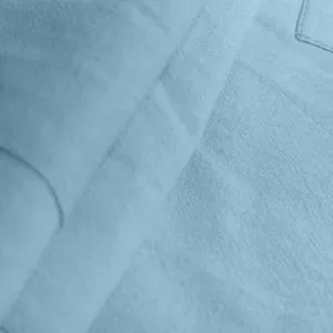Macro view of light blue breathable linen fabric texture on mens cargo shorts