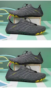 Detailed side profile of grey breathable water shoes with yellow dots and quick-dry mesh