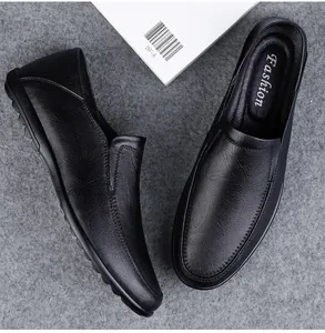 Detail view of premium black soft leather loafers with comfortable slip-on design