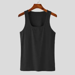 Close-up detail of black ribbed fabric on quick-dry slim fit men's gym tank top vest