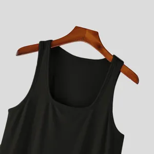 Detailed macro view of black ribbed tank top showing neckline and breathable fabric texture