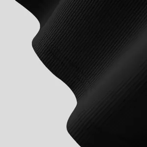 Detail view of black ribbed quick-dry fabric for men's athletic compression tank top