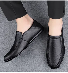 Classic black leather slip-on loafers for men featuring soft textured leather and durable soles