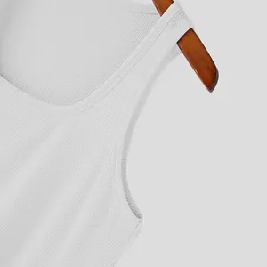 Close-up detail of a white ribbed elastic quick-dry tank top showing the neckline texture