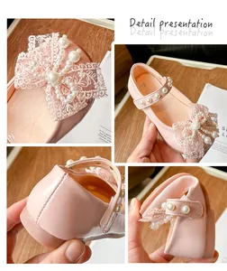 Detailed views of pink girls' princess shoes with lace bows and pearl accents