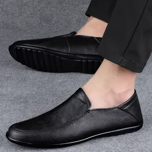Men's classic soft black leather slip-on loafers featuring a flexible rubber sole