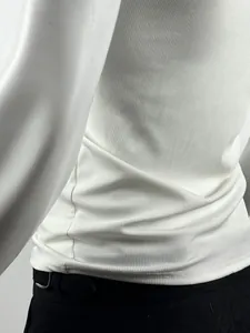Detail shot of white ribbed breathable fabric on slim fit men's athletic tank top