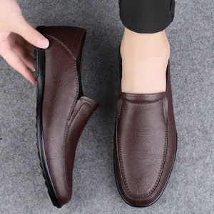 Classic dark brown men's soft leather slip-on loafers with durable rubber sole