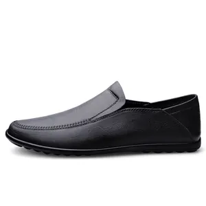 Minimalist black soft leather loafers for men with a comfortable slip-on design.