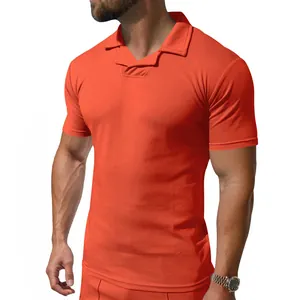 Detail view of men's bright orange quick-dry Polo shirt with a unique Burke collar.