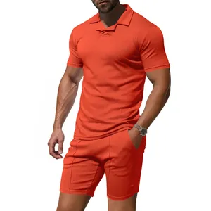 Premium Herren-Set mit leuchtend orangem, schnell trocknendem Polo-Shirt und Shorts