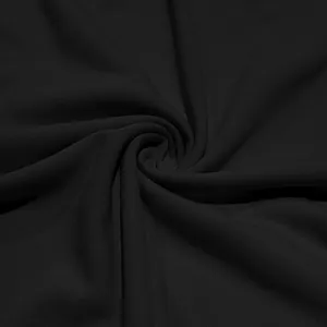 Detailed macro view of breathable quick-dry black mesh fabric for premium men's polo shirt
