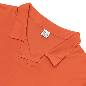 Close-up of orange men's Polo shirt split collar with size and material tag