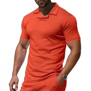 Detail showing the fabric and Burke collar of this orange quick-dry men's polo shirt.