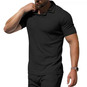 Close-up of a man wearing a black quick-dry polo shirt with a v-neck Burke collar.