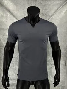 Detail view of premium grey quick-dry men's short sleeve T-shirt with unique notch V-neck