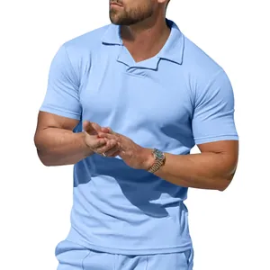 Detail of light blue men's split neck polo shirt showing short sleeves and athletic fit
