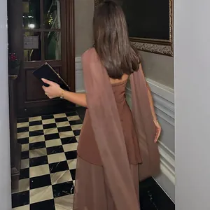 Close-up back view showing mesh texture and scarf collar on elegant brown dress