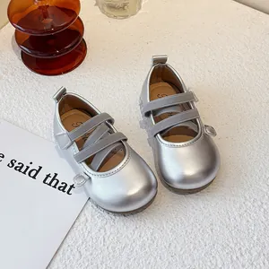 Charming silver metallic Mary Jane princess shoes for girls with elastic cross straps
