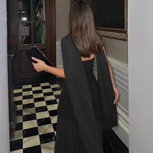 Elegant back view of a sexy black backless tube dress with long mesh scarf sleeves