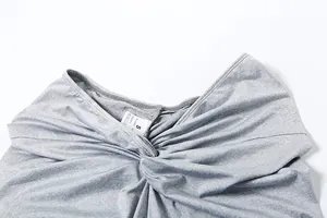 Detail view showing grey twisted knot design on slim fit polyester bodysuit set