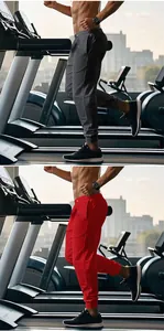 Dettaglio dei pantaloni sportivi da uomo in grigio e rosso per l'allenamento