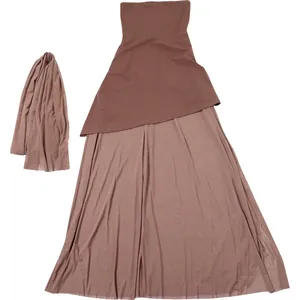 Detailed view of a brown tube top maxi dress featuring a matching mesh scarf set