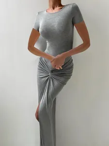 Elegant grey slim fit short sleeve bodysuit and high slit maxi skirt two-piece set