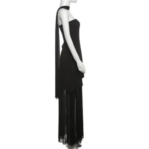 Side view detail of black strapless tube dress with mesh splicing and matching scarf collar