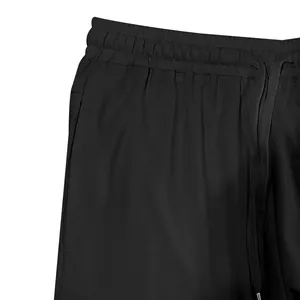 Close-up of elastic waistband and drawstring on black men's casual sports shorts