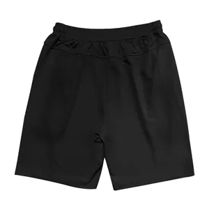 Back view of breathable black men's athletic shorts with elastic waistband.