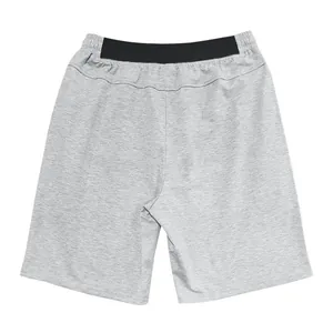 Back view of men's gray athletic shorts featuring an elastic black waistband design.