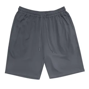 Close-up of men's dark gray casual loose drawstring shorts for jogging and squats