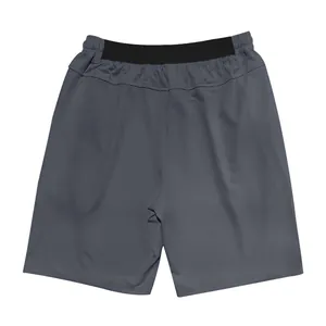 Detailed back view of dark grey athletic shorts for men with a black elastic waistband.