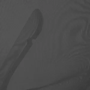 Macro view of the breathable gray mesh fabric on a lightweight men's fitness tank top.