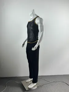 Side view showing a men's black mesh sports tank top with tan trim on mannequin