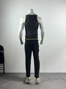 Detail back view of a men's sexy black mesh fitness tank top with gold trim on mannequin