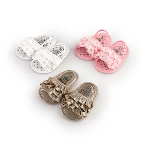 Soft baby ruffled walking sandals for 0-1 year olds in white, pink, and gold colors