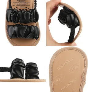 Detailed view of flexible baby pre-walker sandals with ruffled straps and anti-slip sole