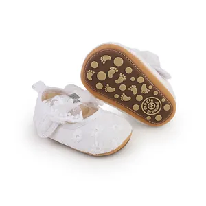 Detailed view of white lace baby princess walking shoes with soft non-slip rubber sole